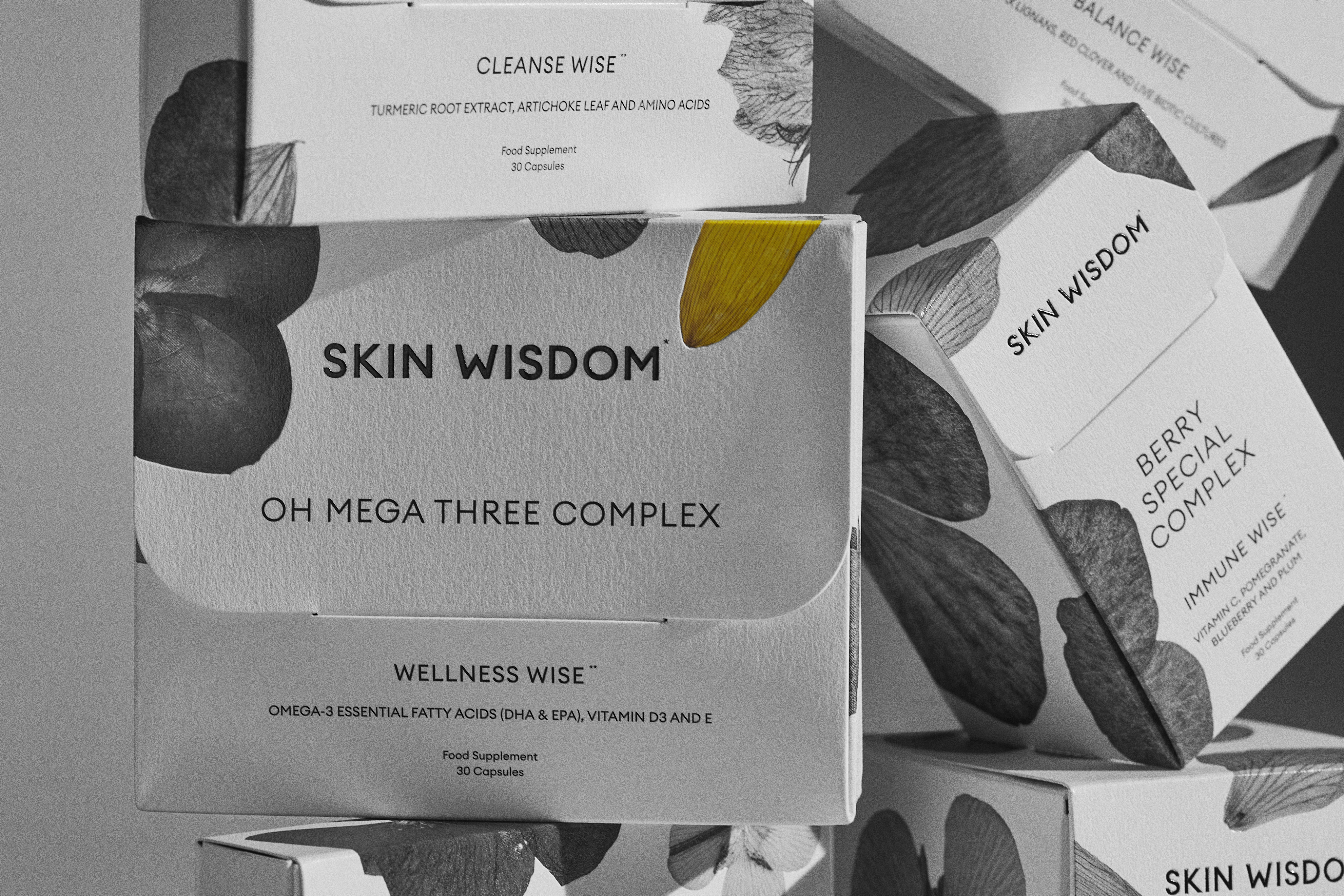 Close up of package of SKIN WISDOM® OH MEGA THREE COMPLEX Omega-3 fatty acid supplement to support healthy skin, heart, joints and brain